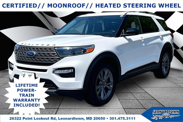 2022 Ford Explorer XLT in Star White Metallic Tri-Coat — front three-quarter view